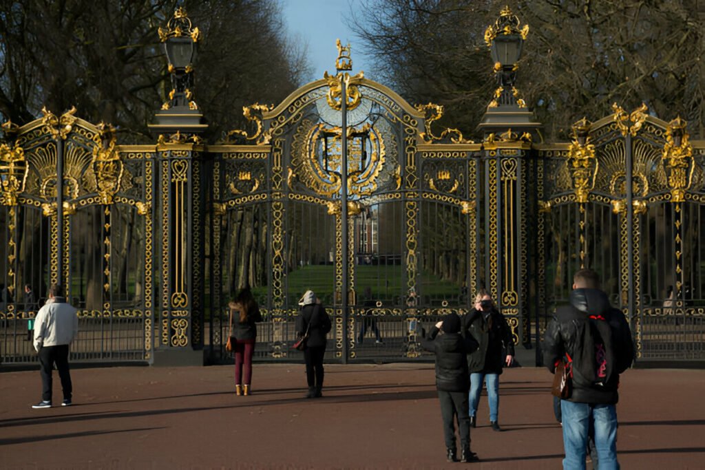 Enjoy a peaceful walk through Green Park after Christmas dinner People walking through Green Park in London during the festive season.