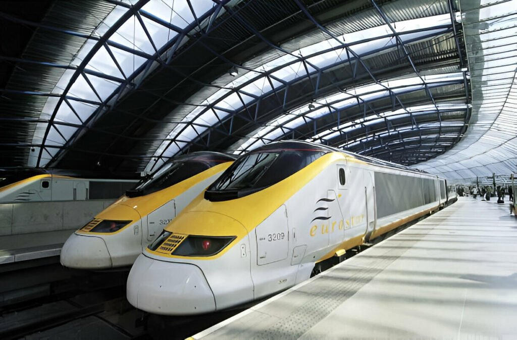 Experience fast and comfortable travel with Eurostar trains across Europe Two Eurostar trains passing through scenic landscapes in Europe