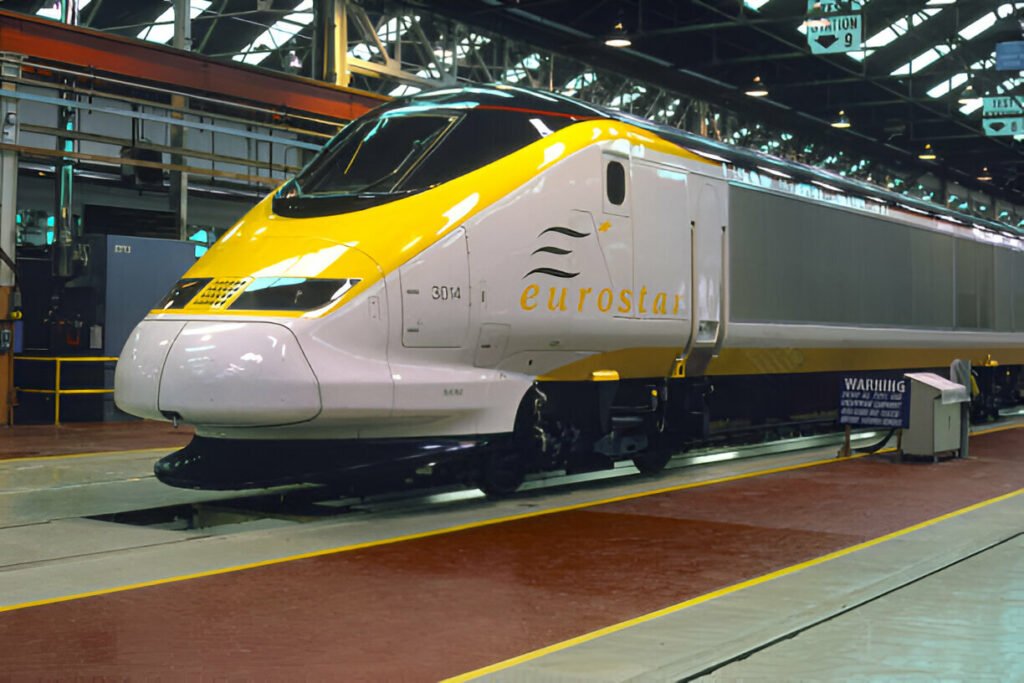 Eurostar Train - Book Your Tickets from £35 in the January 2025 Sale Eurostar Train speeding through scenic countryside in Europe