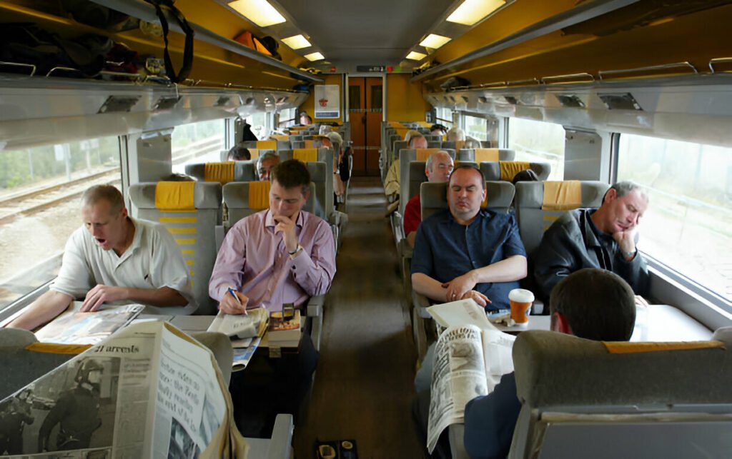 Travel in comfort with Eurostar train tickets for an unforgettable journey. Passengers enjoying their journey inside the Eurostar train, traveling comfortably across Europe.