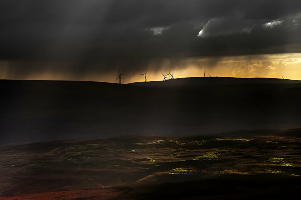 A dark evening sky over the landscapes of Brecon Beacons National Park, Wales, UK – explore more with HouseToMotive A peaceful dark sky over Brecon Beacons National Park, Wales, UK, with rolling hills and open landscapes