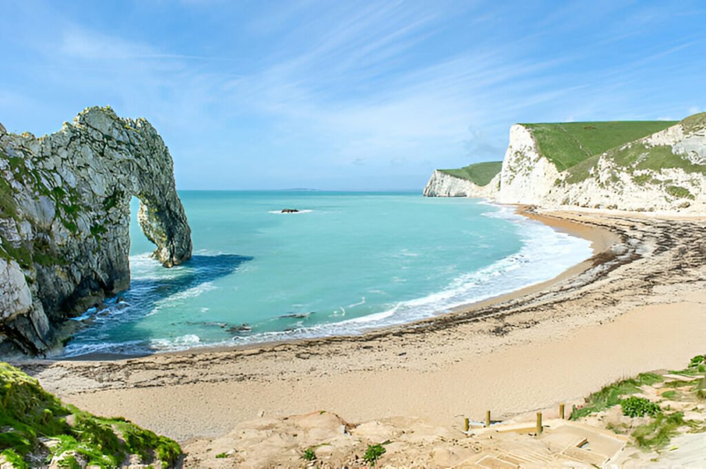 Durdle Door, a natural limestone arch on the Jurassic Coast, Dorset, England, UK Iconic limestone arch of Durdle Door on the Jurassic Coast in Dorset, England, UK