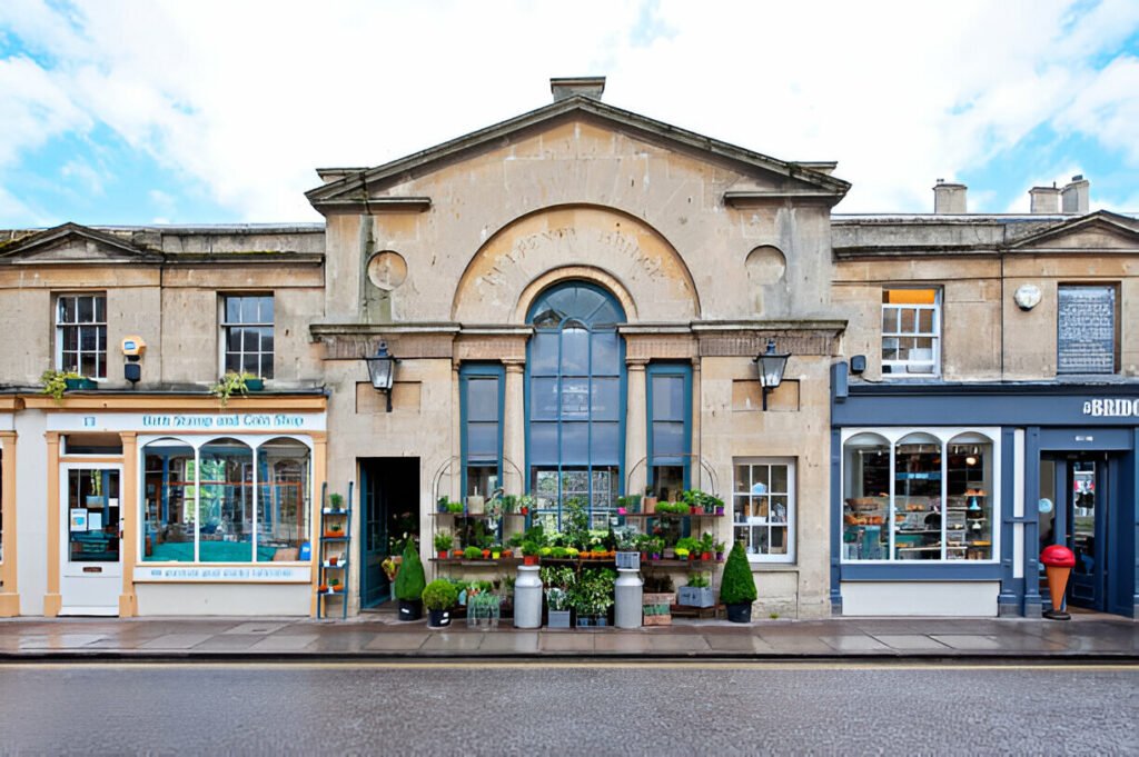 Pulteney Bridge in Bath, UK, a historic riverside landmark with elegant architecture and charming shops Historic Pulteney Bridge in Bath, England, with shops lining the roadside and scenic river views.