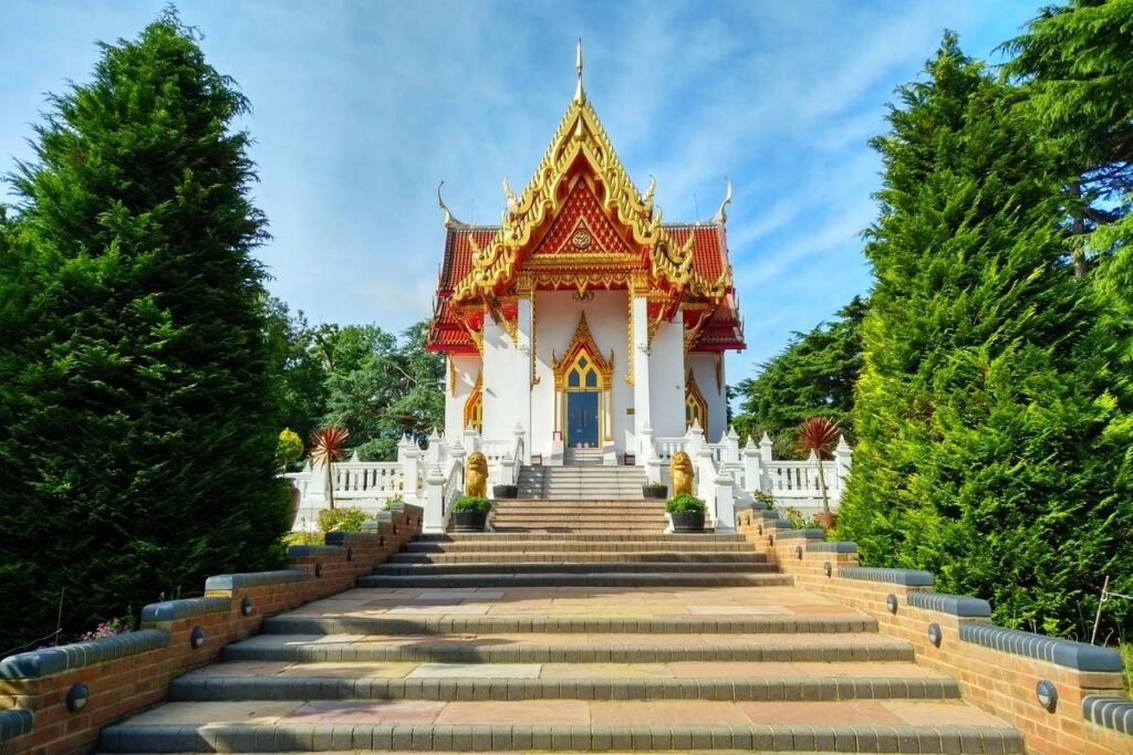 The Buddhapadipa Temple Wimbledon A stunning Thai temple with a golden roof, surrounded by gardens