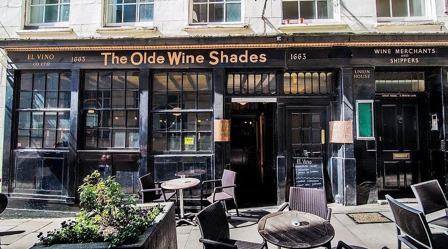 The Olde Wine Shades – London’s Oldest Wine Pub A historic 17th-century wine bar with wooden interiors and a cozy ambiance