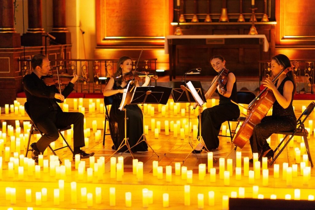 Candlelight Concerts – Must-Visit Places in London | HouseToMotive A mesmerizing candlelit concert in London – A must-see place to visit in London for music lovers