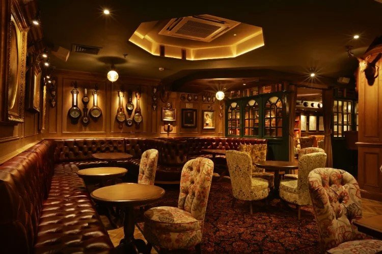 Mr Fogg’s Society of Exploration Best Places to Visit in London HouseToMotive he Victorian-style interior of Mr Fogg’s bar, filled with exploration-themed decor and artifacts.
