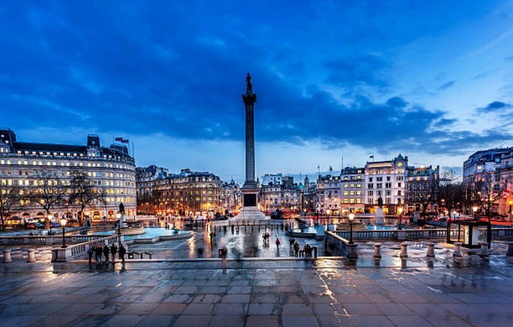 A view of Trafalgar Square with Nelson’s Column and fountains in the background